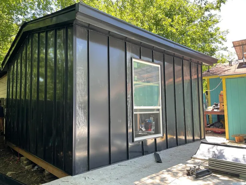 Black standing seam metal wall panels for Roof Inspection in Catonsville